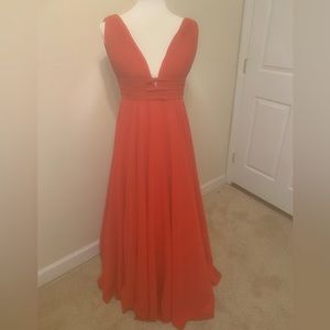 Selling a size 0 Mac Duggal prom dress